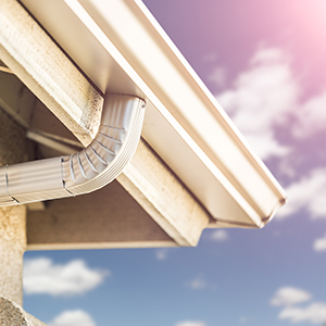 TX Roofing & Consulting Gutter Services - closeup of k-style seamless gutters
